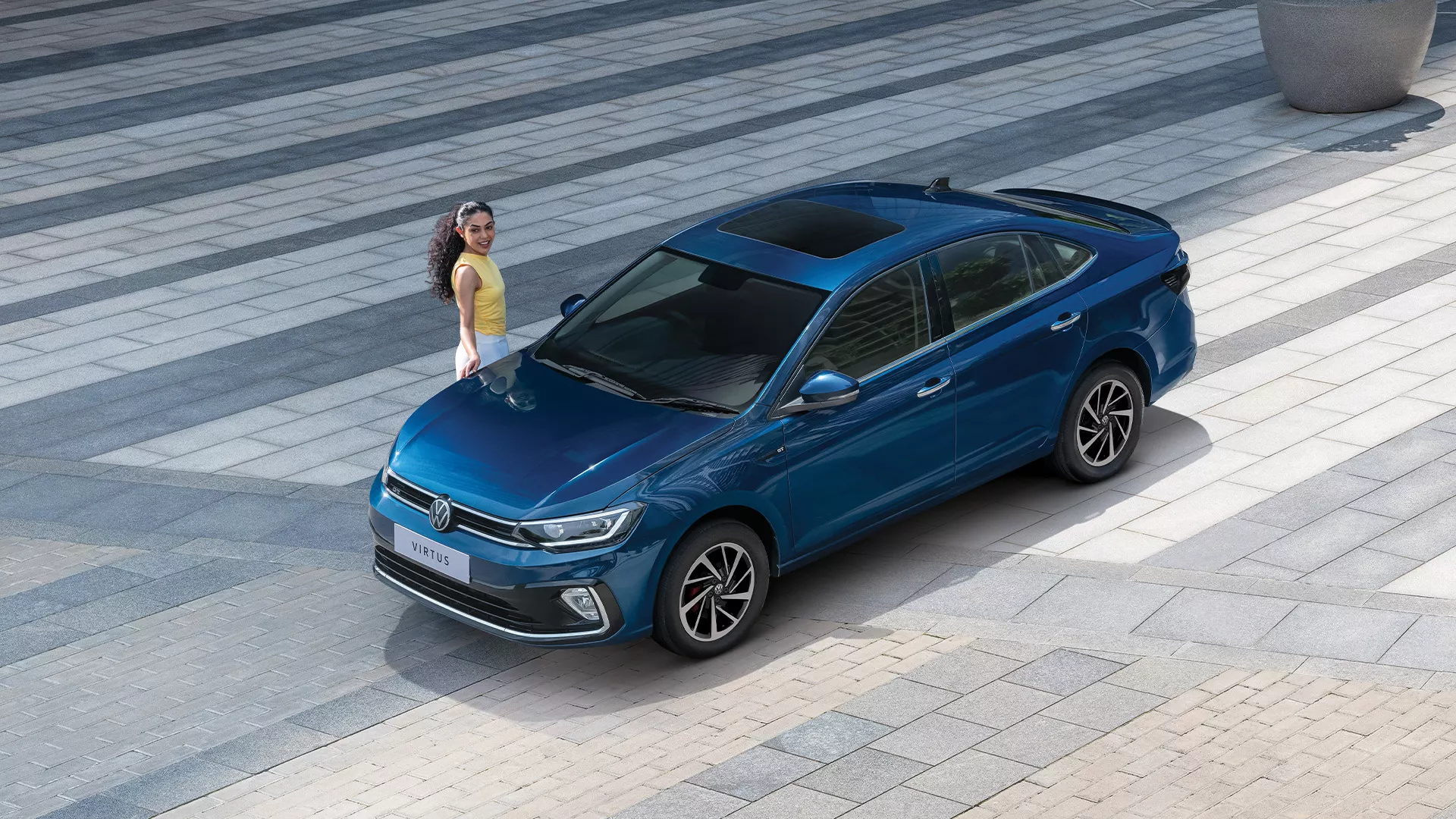 Volkswagen Virtus Chrome sedan with refined chrome details hero banner